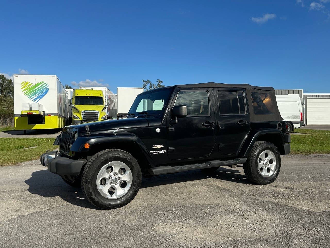 2013 Jeep Wrangler Unlimited for sale at Rubi Motorsports in Sarasota, FL