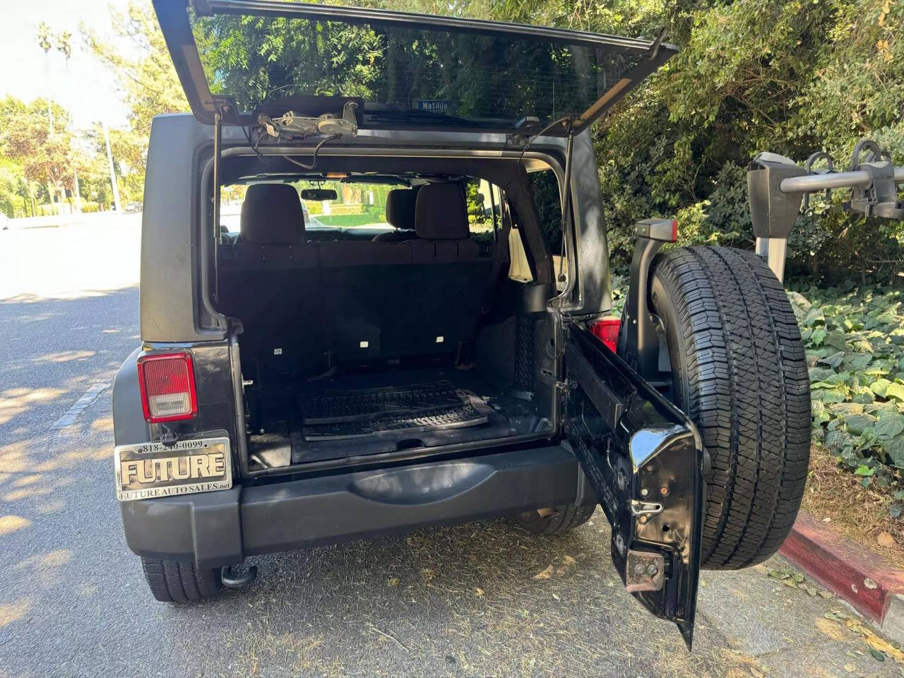 2013 Jeep Wrangler Unlimited for sale at Ride On LLC in Van Nuys, CA