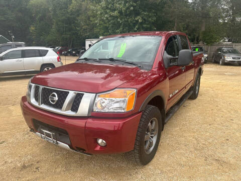 2014 Nissan Titan for sale at Northwoods Auto & Truck Sales in Machesney Park IL