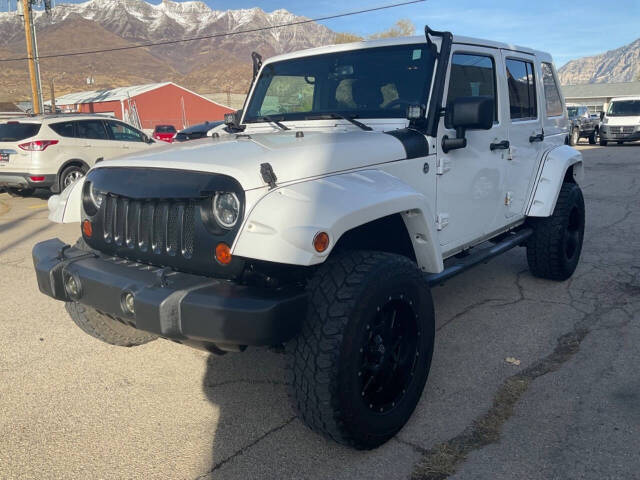 2013 Jeep Wrangler Unlimited for sale at My Planet Auto in Orem, UT