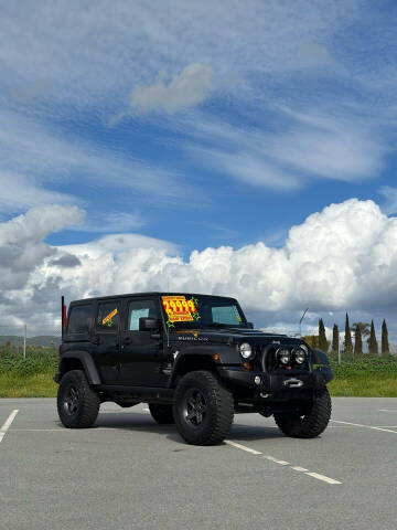 2013 Jeep Wrangler Unlimited for sale at Valdez Auto Sales in Gonzales CA