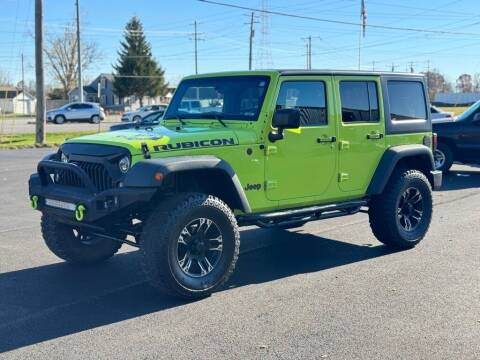 2016 Jeep Wrangler Unlimited for sale at Queen City Auto House LLC in West Chester OH