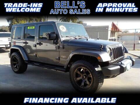 2014 Jeep Wrangler Unlimited for sale at Bell's Auto Sales in Corona CA