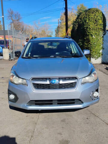 2013 Subaru Impreza for sale at Queen Auto Sales in Denver CO