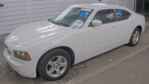 2010 Dodge Charger for sale at M & M Used Cars LLC in Daytona Beach FL