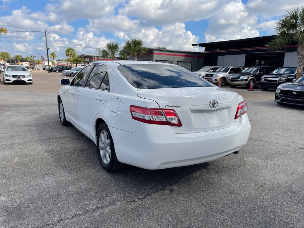 2011 Toyota Camry for sale at SMART CHOICE AUTO in Pasadena, TX