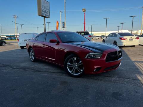2013 Dodge Charger for sale at El Chapin Auto Sales, LLC. in Omaha NE
