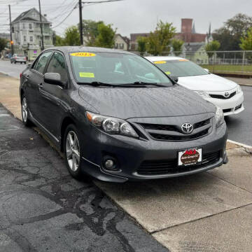 2013 Toyota Corolla for sale at A & J AUTO GROUP in New Bedford MA