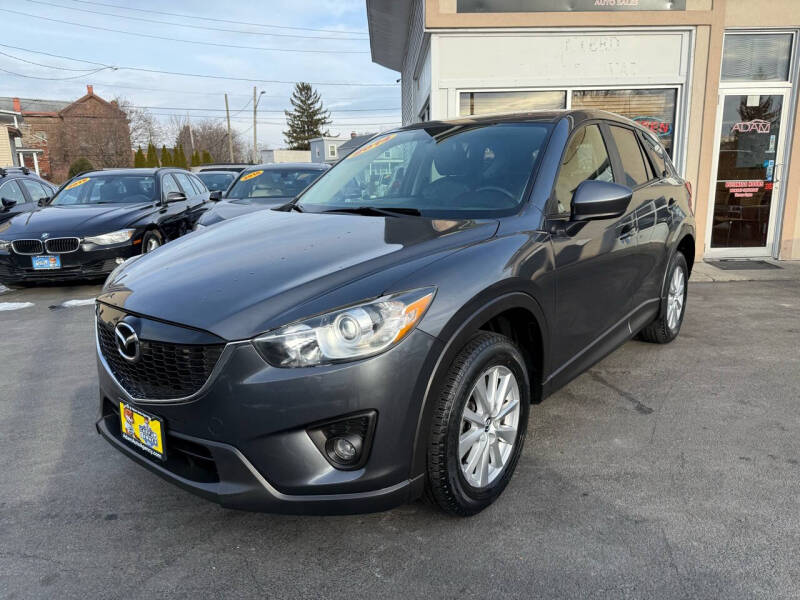 2014 Mazda CX-5 for sale at ADAM AUTO AGENCY in Rensselaer NY