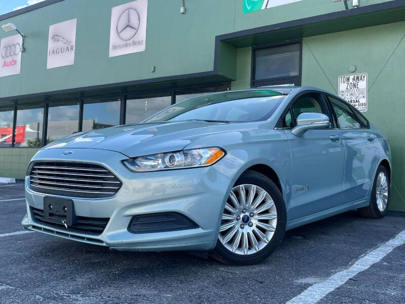 2013 Ford Fusion Hybrid for sale at KARZILLA MOTORS in Oakland Park FL