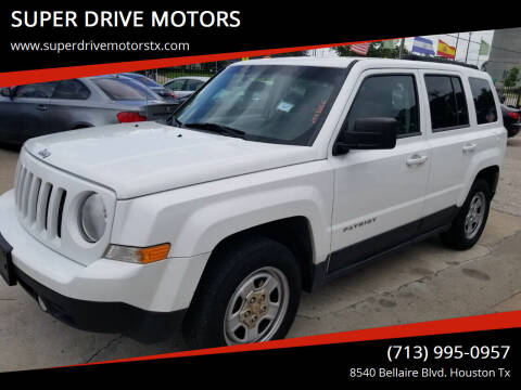 2012 Jeep Patriot for sale at SUPER DRIVE MOTORS in Houston TX