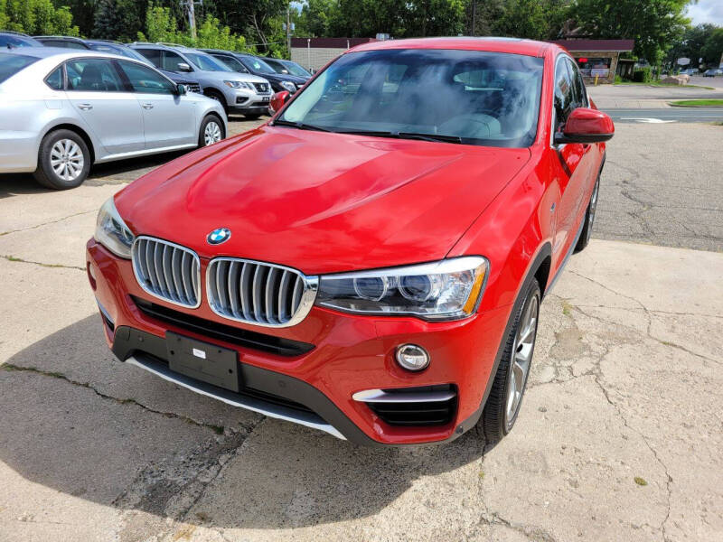 2016 BMW X4 for sale at Prime Time Auto LLC in Shakopee MN