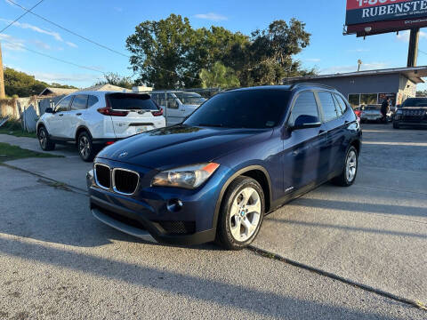 2014 BMW X1 for sale at P J Auto Trading Inc in Orlando FL