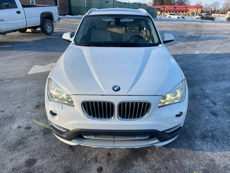 Used 2015 BMW X1 28i with VIN WBAVL1C57FVY26296 for sale in Etna, OH