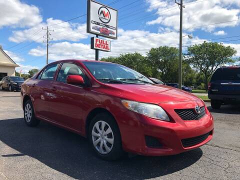 2009 Toyota Corolla for sale at Automania in Dearborn Heights MI