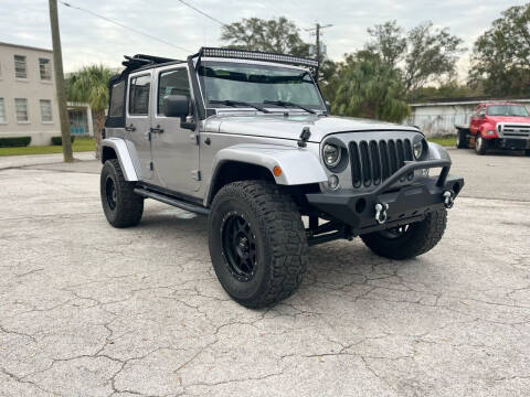 2014 Jeep Wrangler Unlimited for sale at Tampa Trucks in Tampa FL
