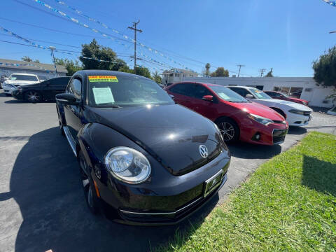 2013 Volkswagen Beetle for sale at ROMO'S AUTO SALES in Los Angeles CA