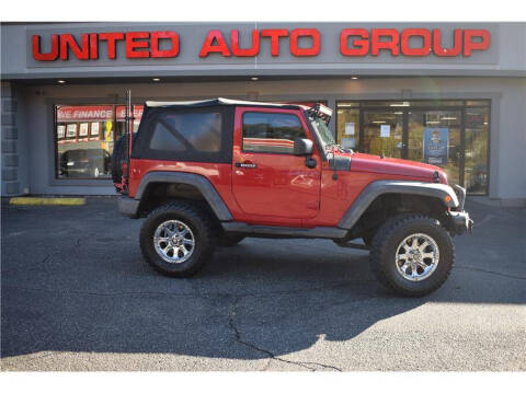 2013 Jeep Wrangler for sale at United Auto Group in Putnam CT