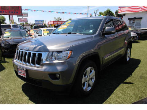 2012 Jeep Grand Cherokee for sale at MERCED AUTO WORLD in Merced CA