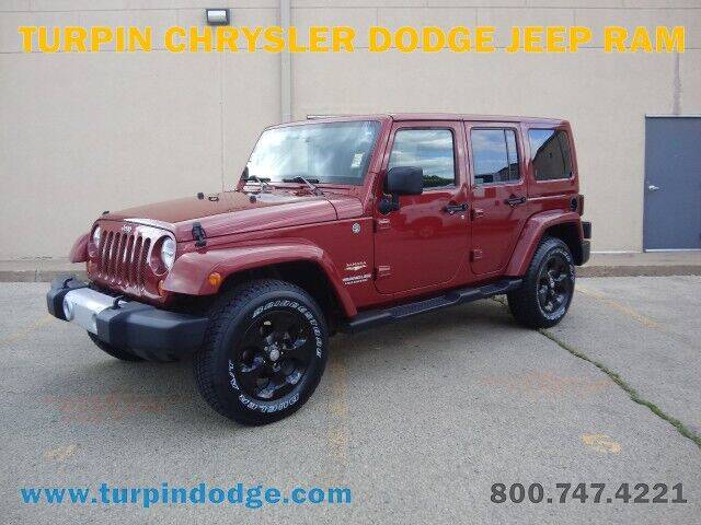 2013 Jeep Wrangler Unlimited for sale at Turpin Chrysler Dodge Jeep Ram in Dubuque IA