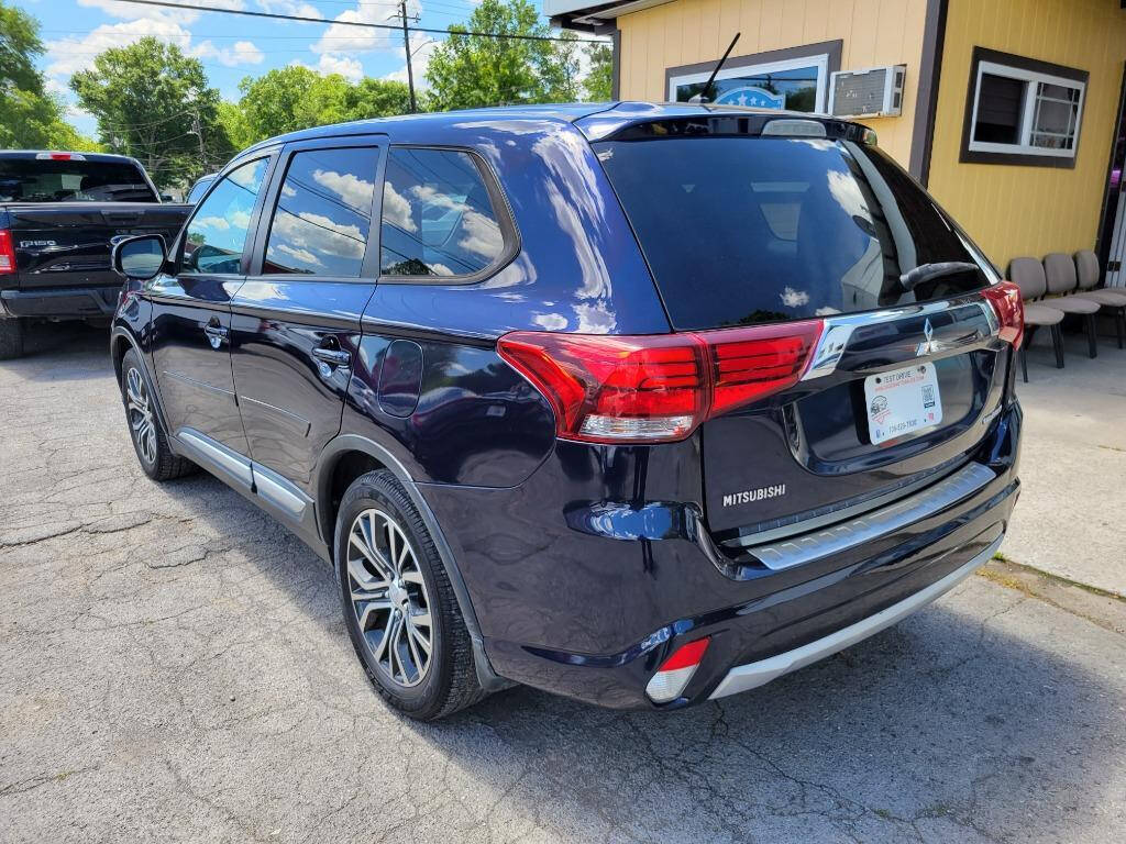 2016 Mitsubishi Outlander for sale at DAGO'S AUTO SALES LLC in Dalton, GA