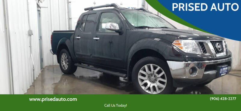 2012 Nissan Frontier for sale at PRISED AUTO in Gladstone MI