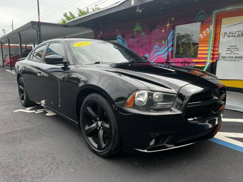 2013 Dodge Charger for sale at EM Auto Sales in Miami FL