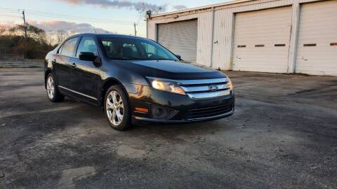 2012 Ford Fusion for sale at ZORA MOTORS in Rosenberg TX