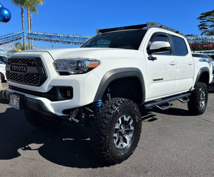 2019 Toyota Tacoma for sale at PONO'S USED CARS in Hilo HI