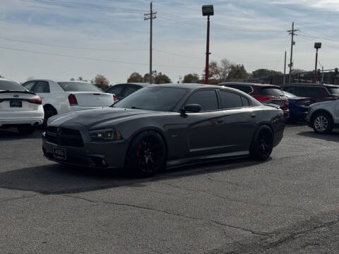 2014 Dodge Charger for sale at El Chapin Auto Sales, LLC. in Omaha NE