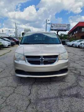 2014 Dodge Grand Caravan for sale at King of Auto in Stone Mountain GA