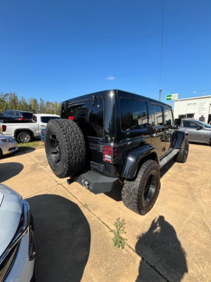 2013 Jeep Wrangler Unlimited for sale at Good Cars and Trucks Wholesale, LLC in Crystal Springs, MS