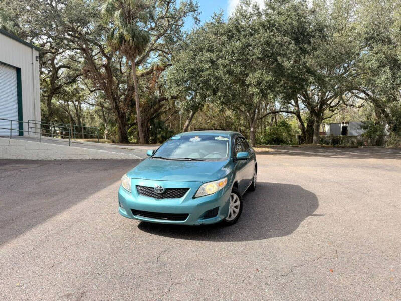 2009 Toyota Corolla for sale at Carnaval Auto Group LLC in Tampa FL