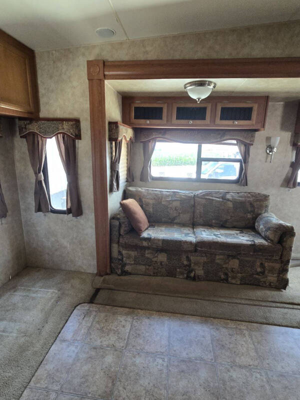 2009 Sportsman 305 RE