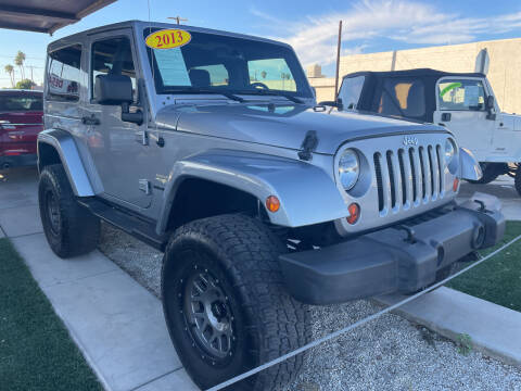 2013 Jeep Wrangler for sale at DESANTIAGO AUTO SALES in Yuma AZ