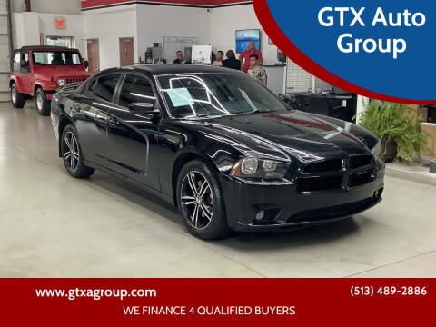 2014 Dodge Charger for sale at UNCARRO in West Chester OH