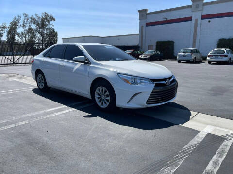 2016 Toyota Camry for sale at E and M Auto Sales in Bloomington CA