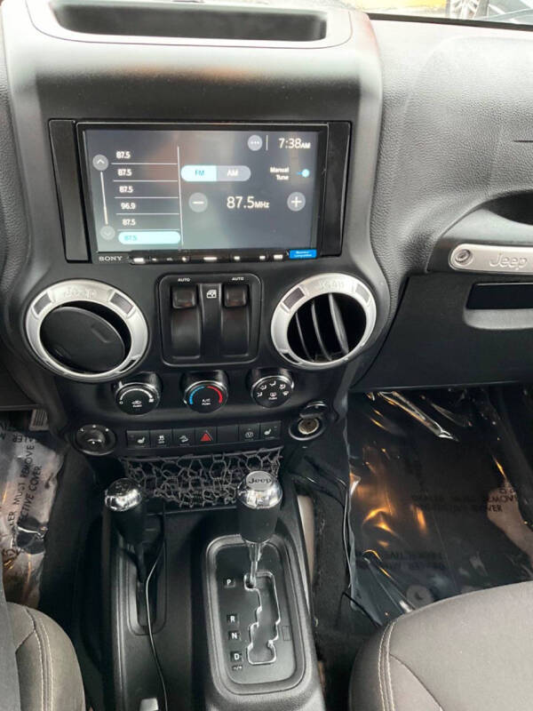 Used 2015 Jeep Wrangler Sahara with VIN 1C4AJWBG0FL665938 for sale in Warwick, RI