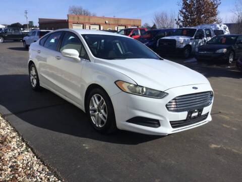 2014 Ford Fusion for sale at Bruns & Sons Auto in Plover WI