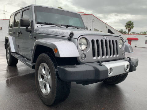 2014 Jeep Wrangler Unlimited for sale at Consumer Auto Credit in Tampa FL