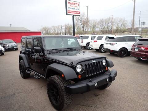 2012 Jeep Wrangler Unlimited for sale at Marty's Auto Sales in Savage MN