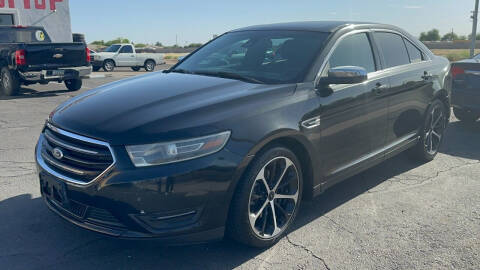 2015 Ford Taurus for sale at 911 AUTO SALES LLC in Glendale AZ