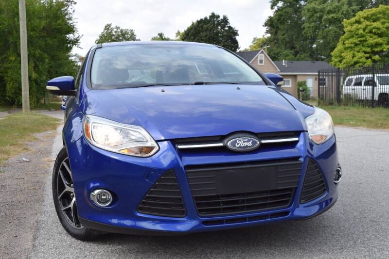 2014 Ford Focus for sale at QUEST AUTO GROUP LLC in Redford MI