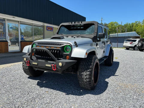 2012 Jeep Wrangler Unlimited for sale at Dreamers Auto Sales in Statham GA