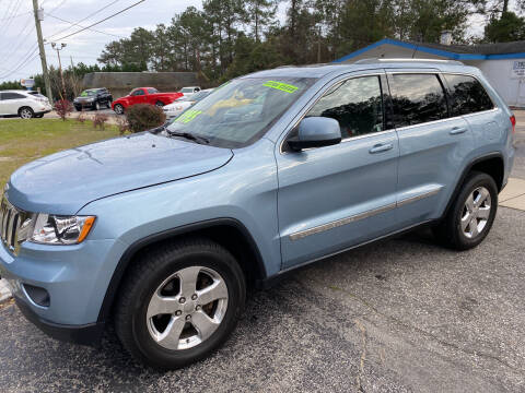 2012 Jeep Grand Cherokee for sale at TOP OF THE LINE AUTO SALES in Fayetteville NC