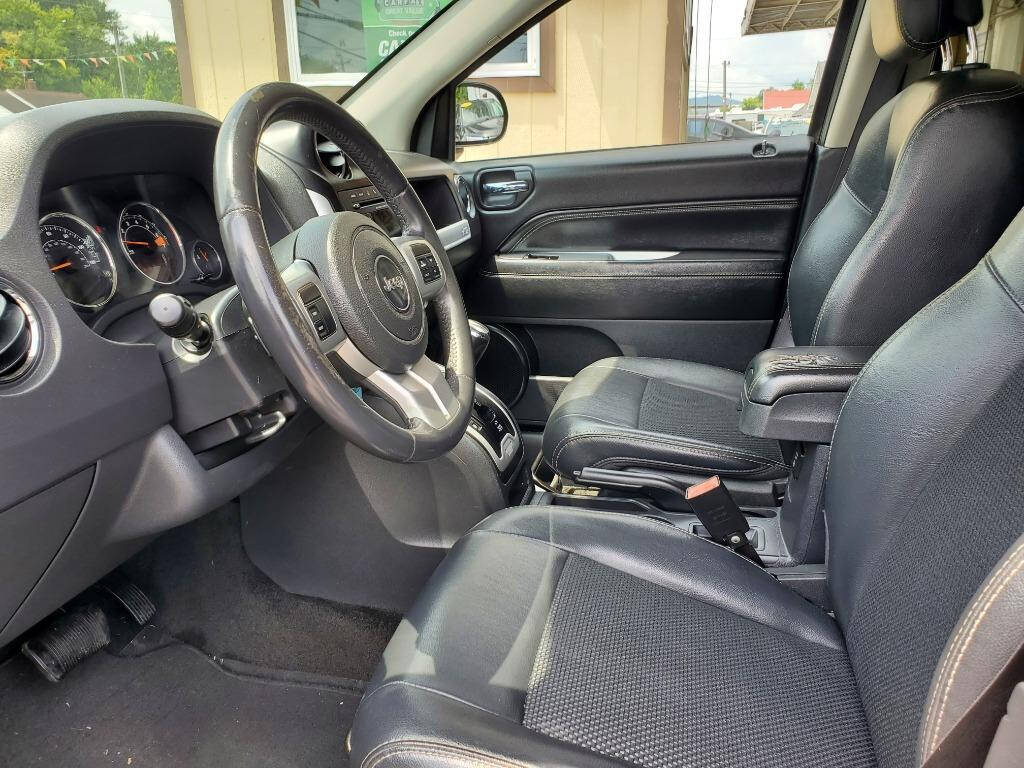 2016 Jeep Compass for sale at DAGO'S AUTO SALES LLC in Dalton, GA