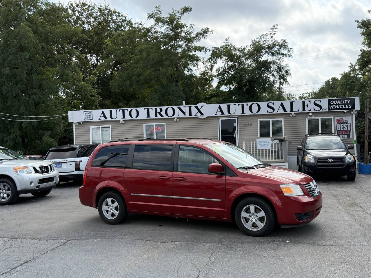 Red 2010 Dodge Grand Caravan SXT FWD Minivan Front-Wheel Drive 6-Speed Automatic