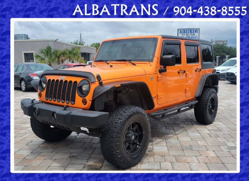 2013 Jeep Wrangler Unlimited for sale at Albatrans Car & Truck Sales in Jacksonville FL