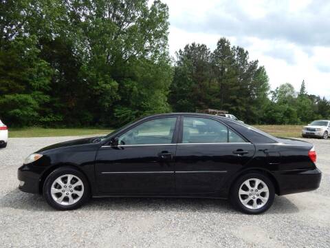 2005 Toyota Camry for sale at DRM Special Used Cars in Starkville MS