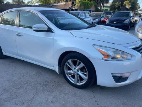 2014 Nissan Altima for sale at STEECO MOTORS in Tampa FL
